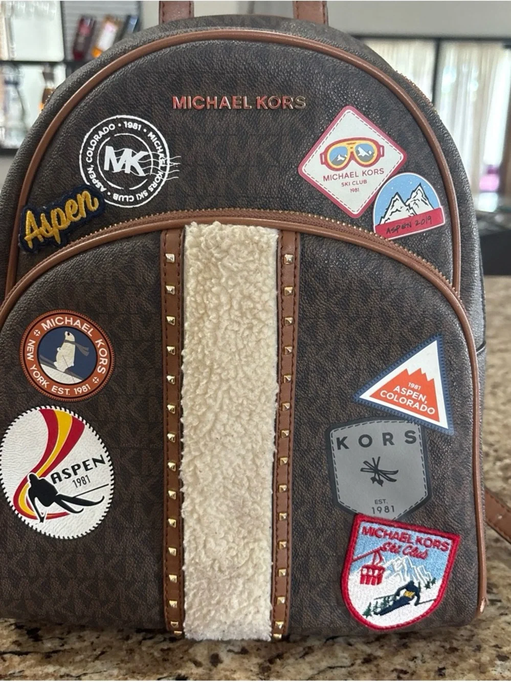 Michael Kors Brown Logo-Print Backpack with Cream Shearling Trim